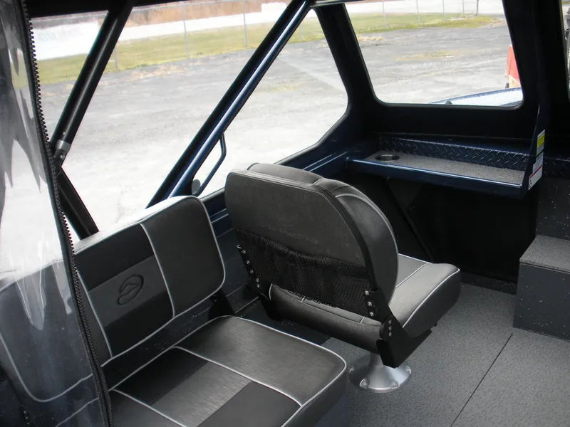 Slide: The Image of 2024 Duckworth 18 Advantage Sport interior seating and dashboard. - 11