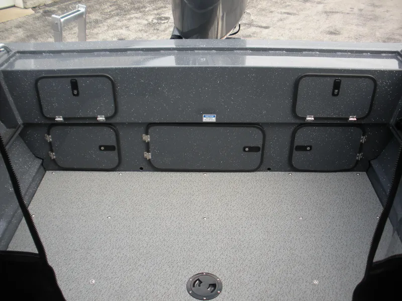 Slide: The Image of 2024 Duckworth 18 Advantage Sport boat interior with storage compartments. - 13