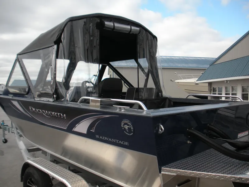 Slide: The Image of 2024 Duckworth 18 Advantage Sport boat with canopy on trailer. - 3