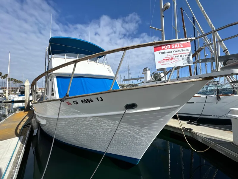 Slide: The Image of 1980 DeFever Trunk Cabin Motoryacht with Cummins repower, docked and for sale. - 8