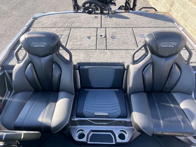 Slide: The Image of 2025 Skeeter FXR20 Limited boat seats with sleek black design and FXR Series branding. - 12