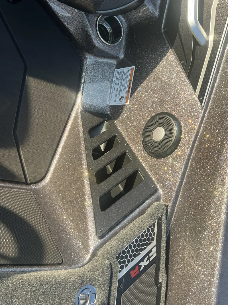 Slide: The Image of 2025 Skeeter FXR20 Limited interior with speaker and textured surfaces. - 6