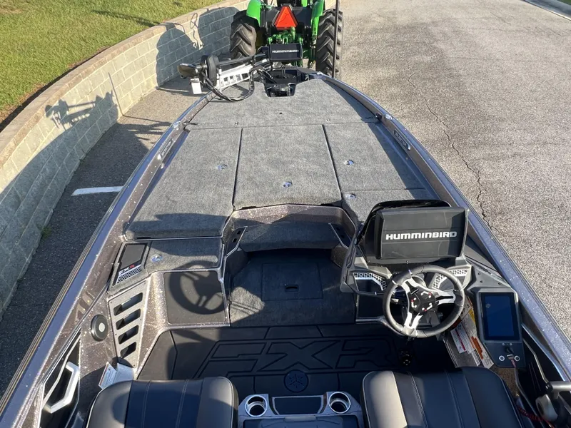 Slide: The Image of 2025 Skeeter FXR20 Limited boat interior with Humminbird electronics and steering wheel. - 9