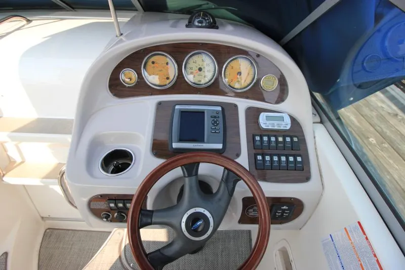 Slide: The Image of 2006 Chaparral 276 Signature Cruiser dashboard with gauges and controls. - 16