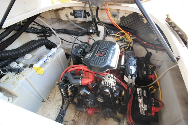 Slide: The Image of Engine compartment of 2006 Chaparral 276 Signature Cruiser with visible wiring and components. - 36