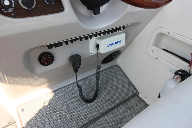 Slide: The Image of 2006 Chaparral 276 Signature Cruiser dashboard with Lowrance marine electronics. - 18