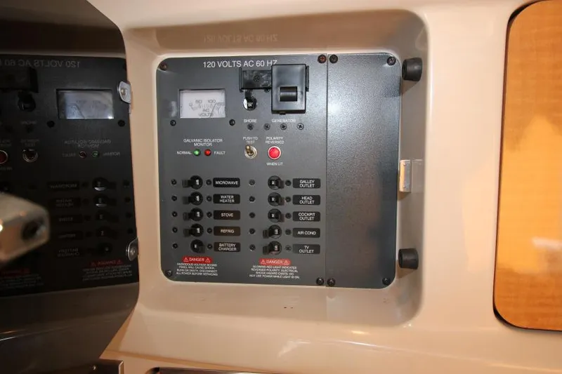 Slide: The Image of Electrical panel of 2006 Chaparral 276 Signature Cruiser, featuring various switches and indicators. - 34