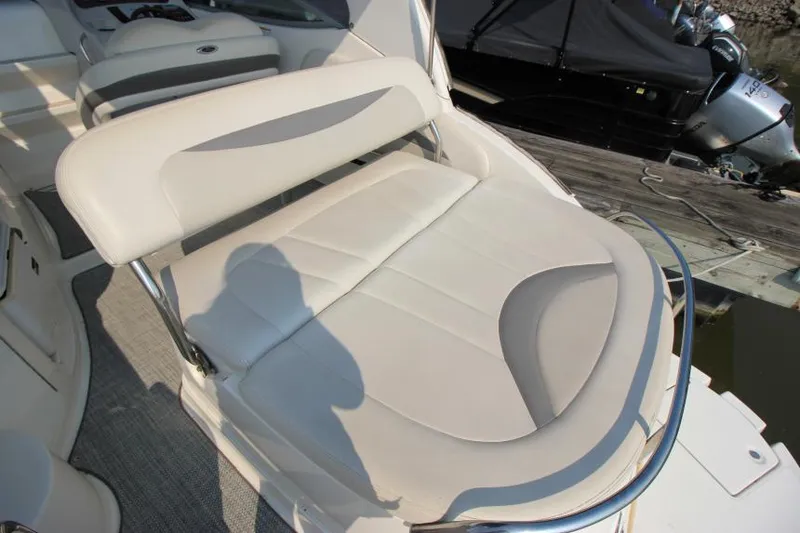 Slide: The Image of 2006 Chaparral 276 Signature Cruiser with white leather seating on deck. - 8