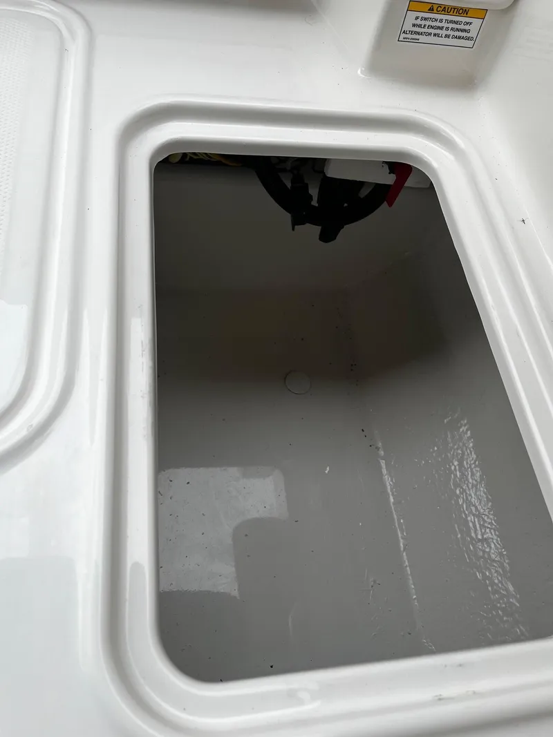 Slide: The Image of Storage compartment of 2024 Bayliner DX2000 boat. - 9