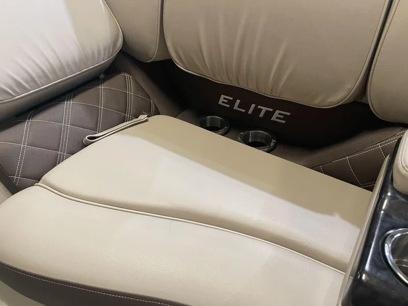 Slide: The Image of Luxurious seating in the 2023 SunCatcher Elite 324SS boat with cup holders. - 4