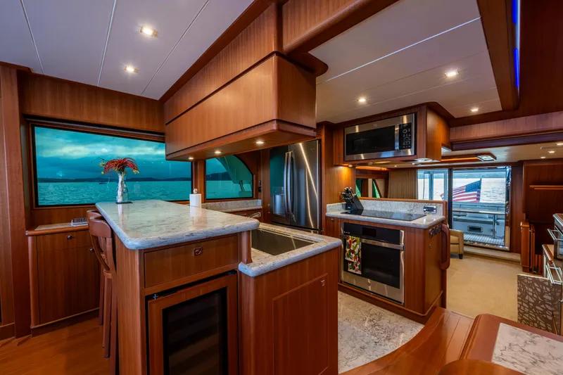 Slide: The Image of Luxurious kitchen interior of the 2025 Hampton Endurance 630 Euro yacht. - 13