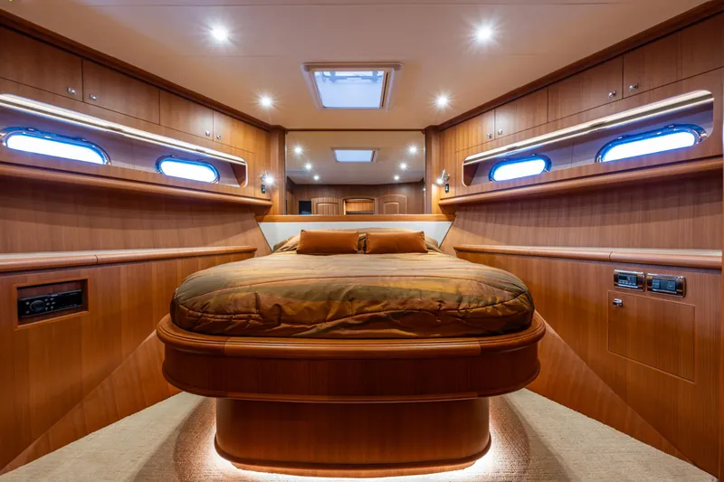 Slide: The Image of Luxurious master bedroom on the 2025 Hampton Endurance 630 Euro yacht. - 14
