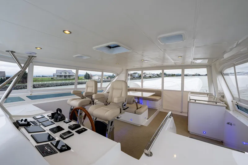 Slide: The Image of Luxurious helm station of the 2025 Hampton Endurance 630 Euro yacht with modern controls. - 17