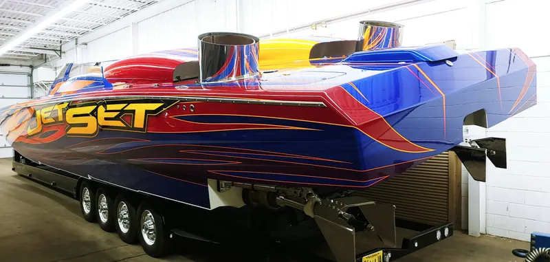 Slide: The Image of Colorful Skater 50 speedboat Jet Set in a garage, 2020 model. - 15