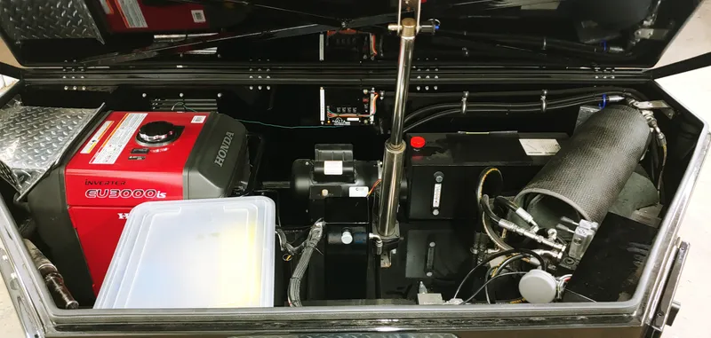 Slide: The Image of Skater 50 2020 model engine compartment with Honda EU3000is inverter generator. - 20