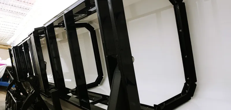 Slide: The Image of Close-up of Skater 50 boat frame, 2020 model, showcasing black metal structure. - 21