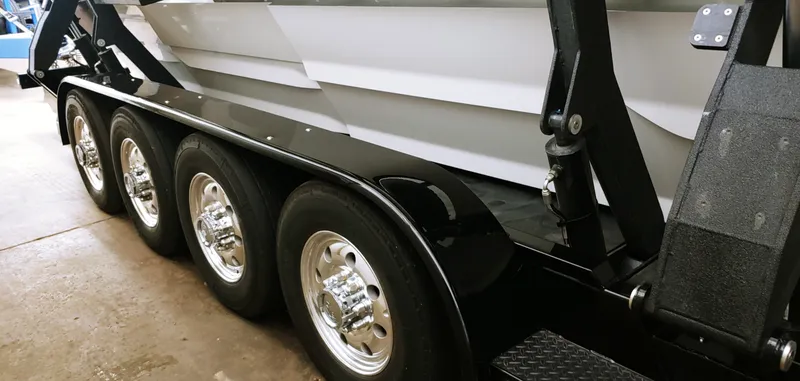 Slide: The Image of Close-up of Skater 50 trailer wheels and suspension system, 2020 model. - 23