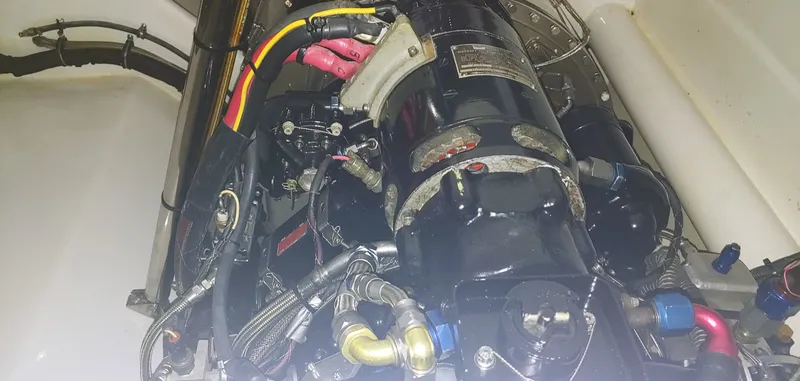 Slide: The Image of Close-up of Skater 50 engine components, 2020 model, showing wiring and mechanical parts. - 25