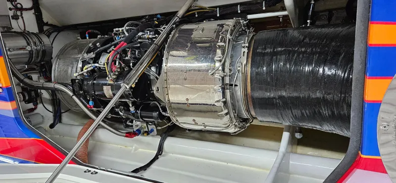 Slide: The Image of Close-up of Skater 50 boat engine, 2020 model, showcasing intricate mechanical components. - 7