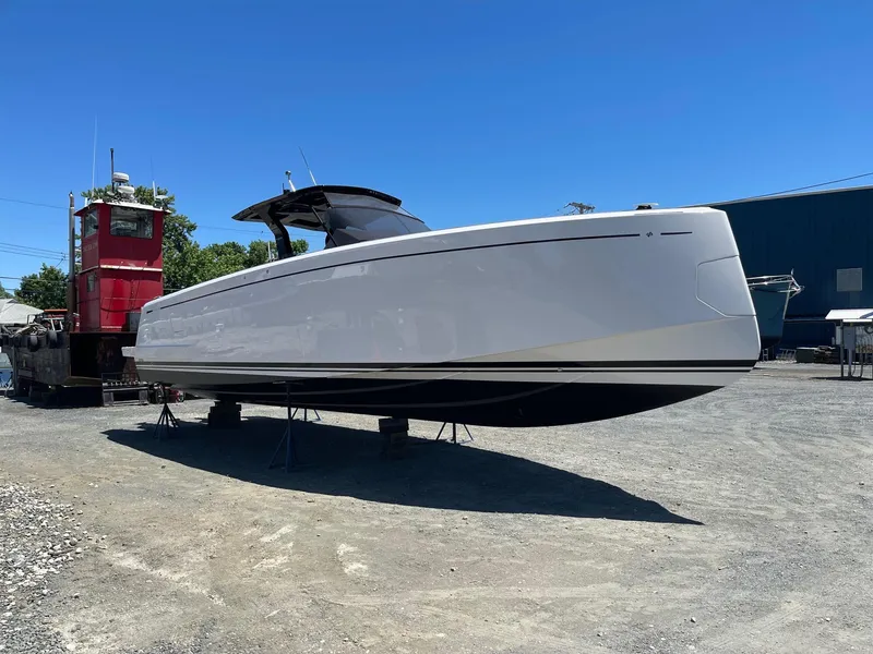 Slide: The Image of 2023 Pardo Yachts 38 on dry dock under clear blue sky. - 12