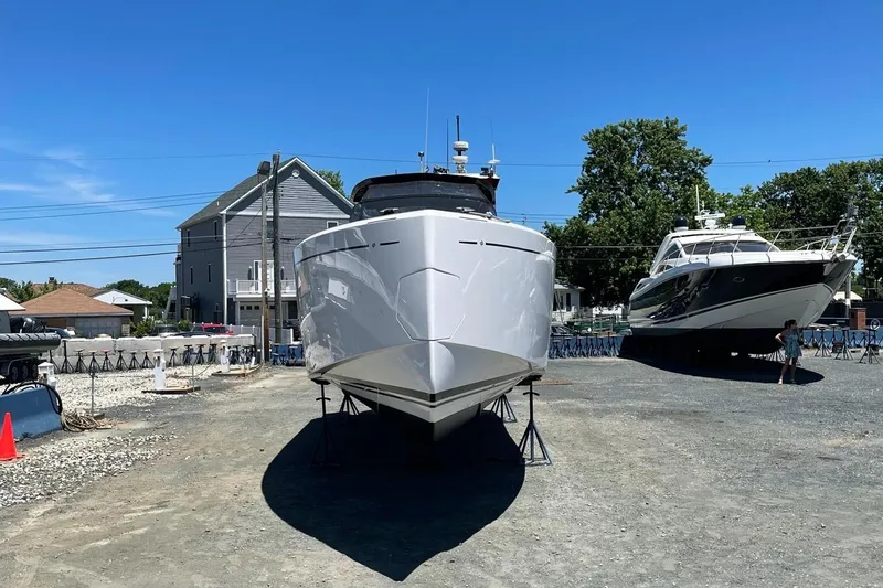 Slide: The Image of 2023 Pardo Yachts 38 on dry dock under clear blue sky. - 13