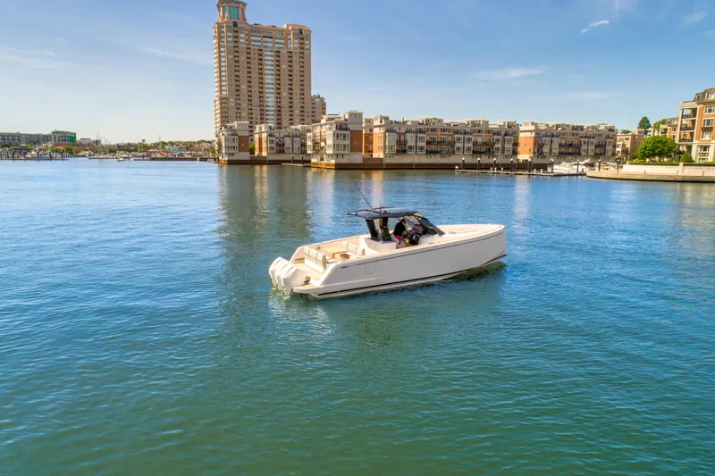 Slide: The Image of 2023 Pardo Yachts 38 cruising in a calm urban harbor. - 15