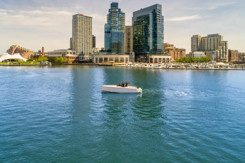 Slide: The Image of 2023 Pardo Yachts 38 cruising in urban waterfront with city skyline. - 18