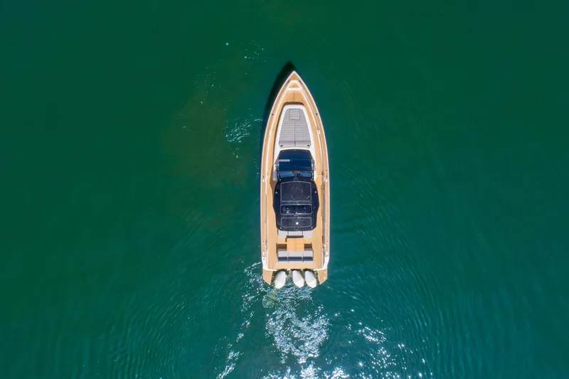 Slide: The Image of Aerial view of 2023 Pardo Yachts 38 cruising on clear blue water. - 19