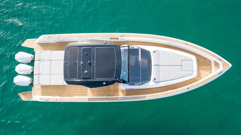 Slide: The Image of Top view of 2023 Pardo Yachts 38 model on clear blue water. - 24