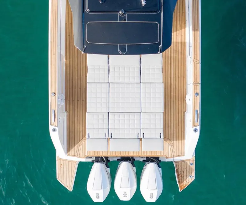Slide: The Image of Top view of 2023 Pardo Yachts 38 with triple outboard engines. - 25