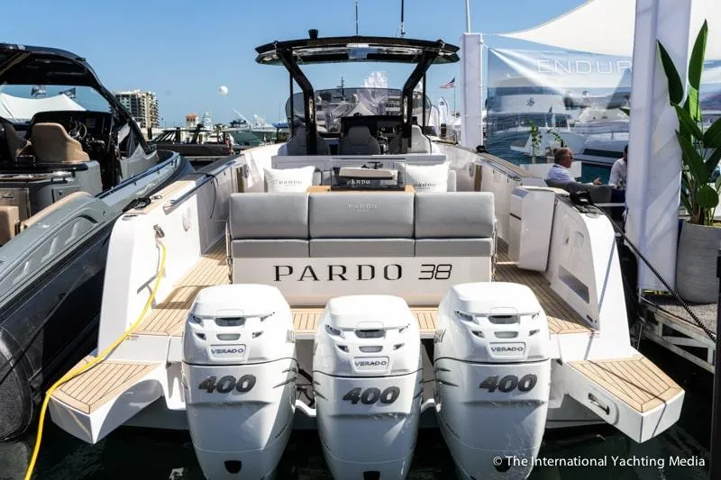 Slide: The Image of 2023 Pardo Yachts 38 with triple 400 horsepower engines at a boat show. - 48