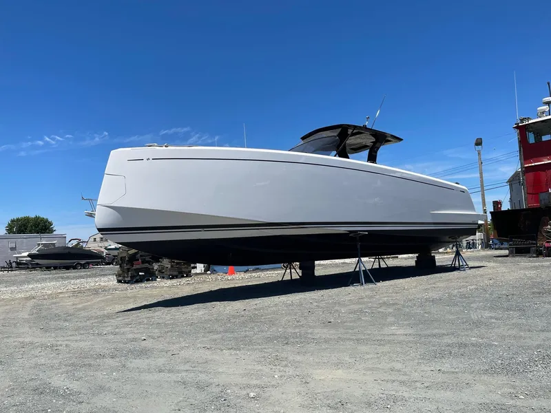 Slide: The Image of 2023 Pardo Yachts 38 on dry dock under clear blue sky. - 6