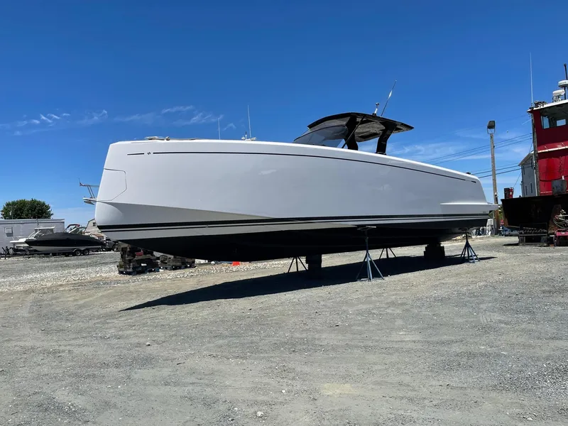 Slide: The Image of 2023 Pardo Yachts 38 on dry dock under clear blue sky. - 8