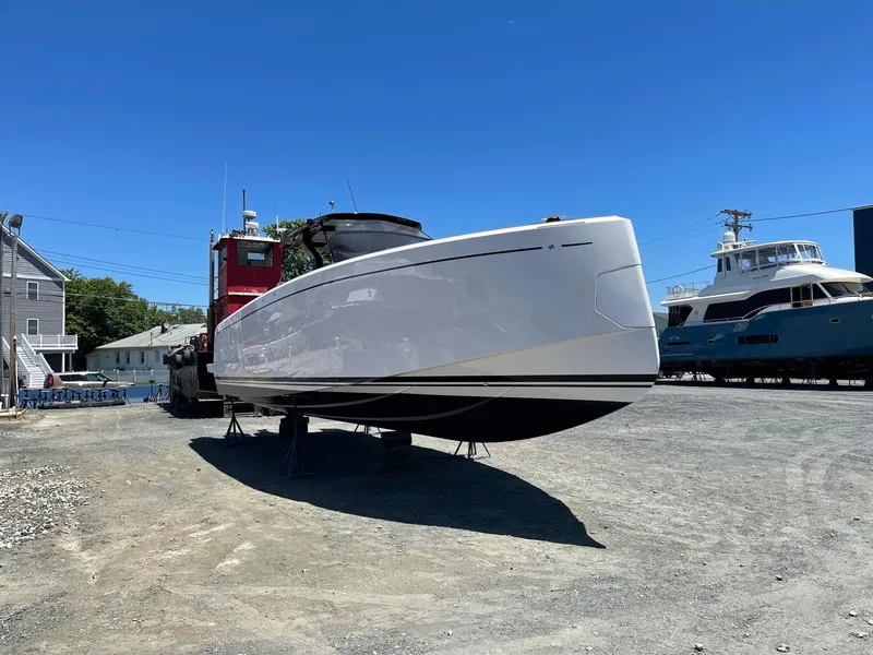 Slide: The Image of 2023 Pardo Yachts 38 on dry dock under clear blue sky. - 9
