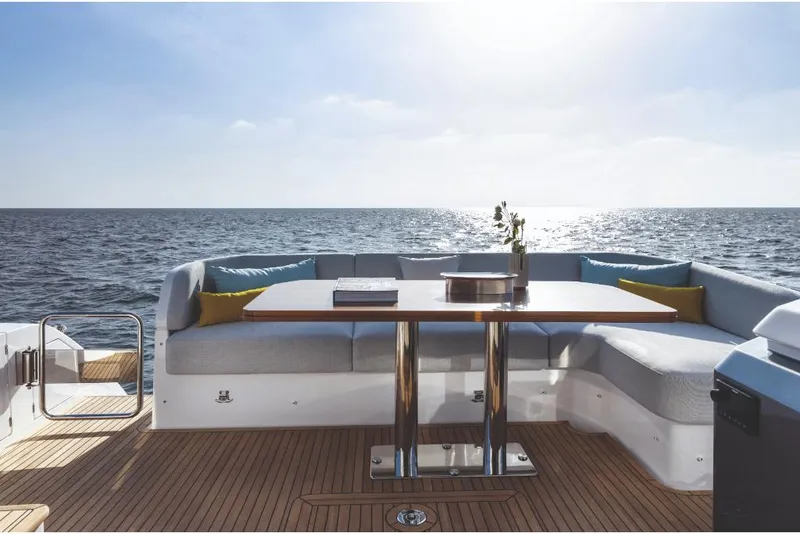 Slide: The Image of Luxury seating area on the 2023 Azimut 53 yacht with ocean view. - 12