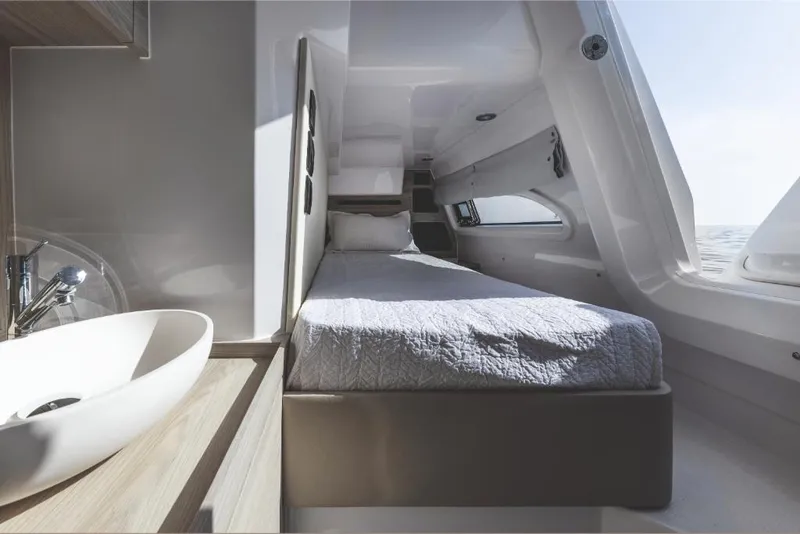 Slide: The Image of Modern bedroom interior of 2023 Azimut 53 yacht with bed and sink. - 14