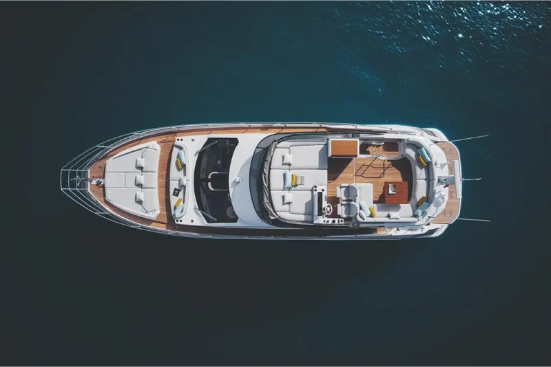 Slide: The Image of Aerial view of 2023 Azimut 53 yacht on calm water. - 5