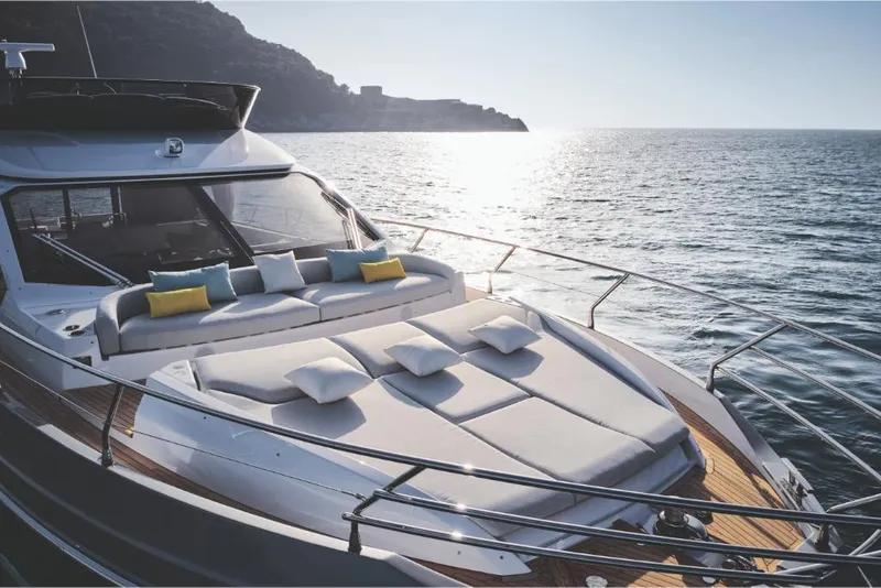 Slide: The Image of 2023 Azimut 53 yacht with luxurious sunbathing area on the deck. - 7