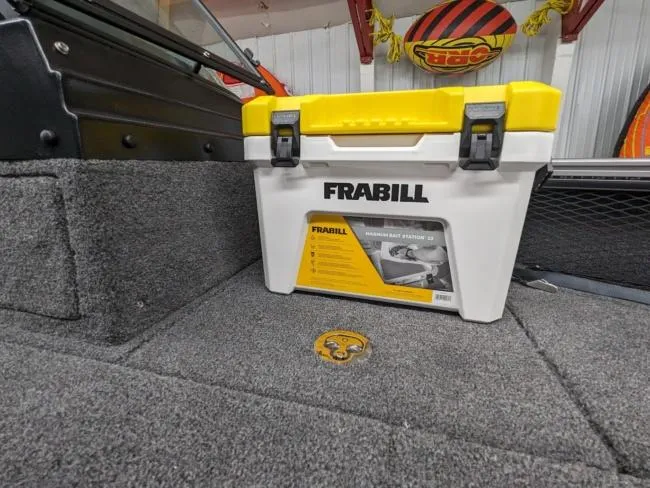 Slide: The Image of Frabill cooler on 2025 Lund 1975 Pro V Sport boat with carpeted deck. - 14