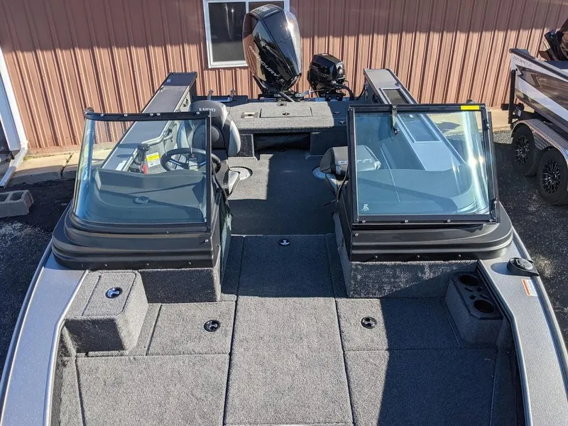 Slide: The Image of 2025 Lund 2075 Pro V Sport fishing boat with dual consoles and spacious deck. - 3