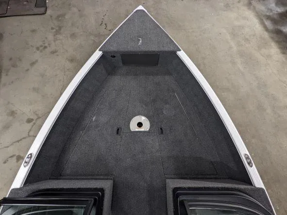 Slide: The Image of 2024 Lund 1775 Adventure Sport boat interior, front deck view. - 8