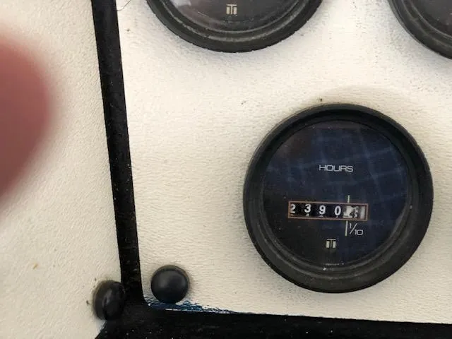 Slide: The Image of Hour meter on 1983 Sea Ray 390 Sport Fisherman showing 2390.4 hours. - 8