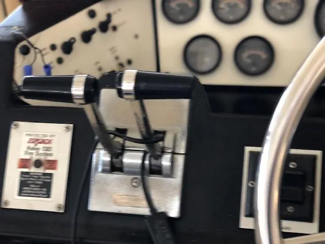 Slide: The Image of Close-up of 1983 Sea Ray 390 Sport Fisherman boat controls and dashboard. - 9