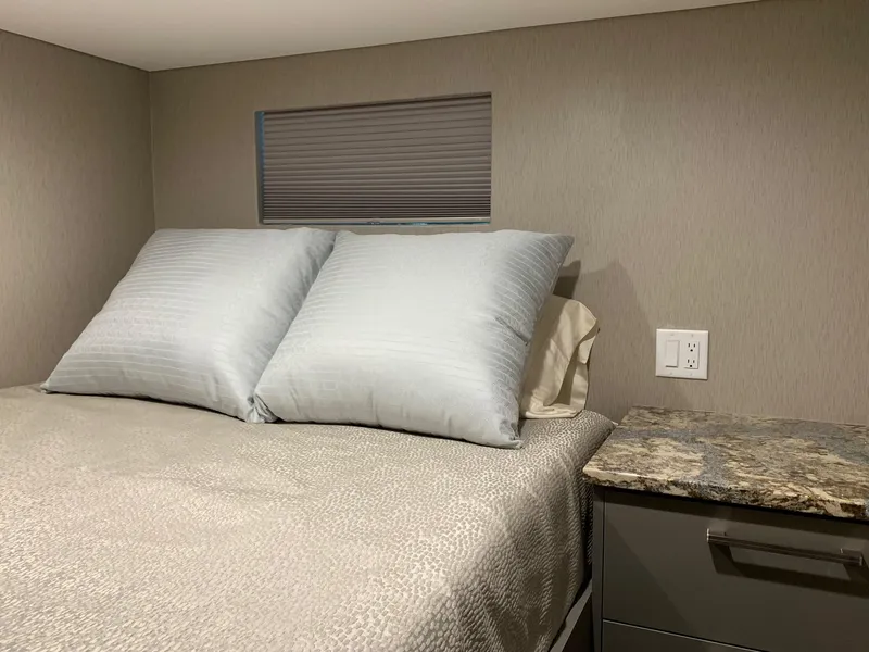 Slide: The Image of Cozy bedroom interior in 2019 Adonia Rhapsody Share #11 with plush pillows and modern decor. - 6