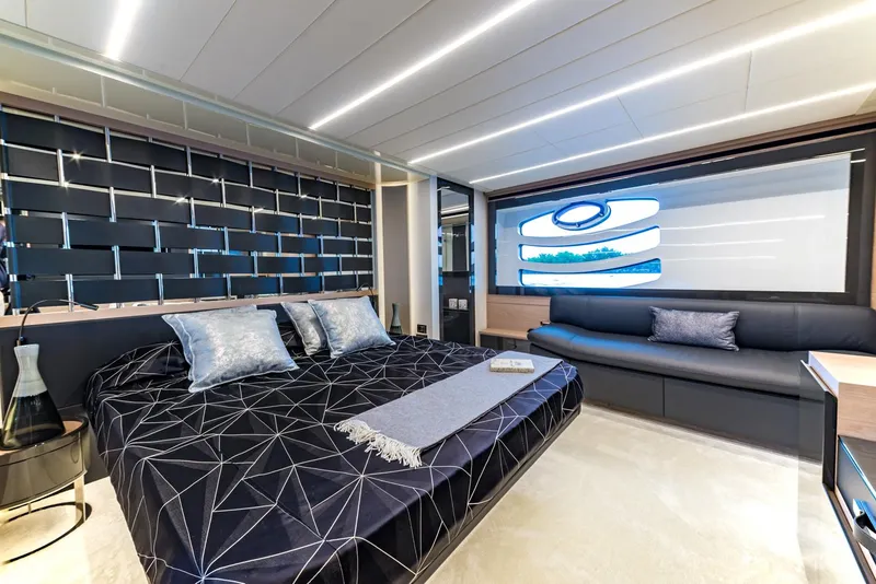 Slide: The Image of Luxurious bedroom interior of 2018 Pershing 70 yacht with modern design and elegant furnishings. - 10