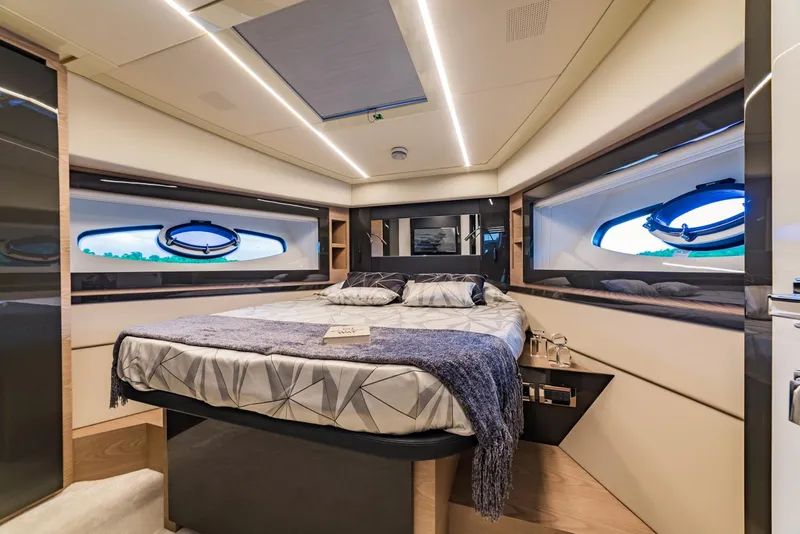 Slide: The Image of Luxurious bedroom interior of 2018 Pershing 70 yacht with modern design. - 15