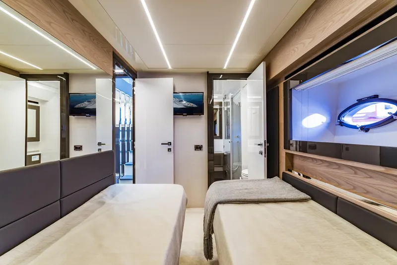 Slide: The Image of Luxurious twin cabin interior of 2018 Pershing 70 yacht with modern design. - 20