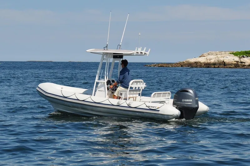 The Image of 2024 Ribcraft 6.8 boat on the water with Yamaha outboard motor. - 0