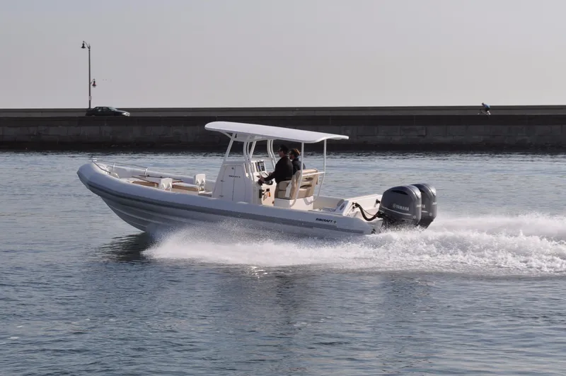 The Image of 2024 Ribcraft 9.0 boat cruising on water with Yamaha outboard motor. - 0