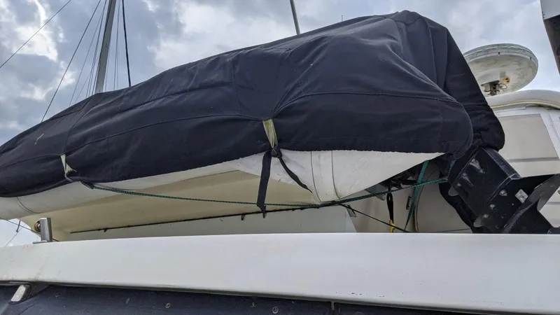 Slide: The Image of Covered boat on a 1992 Jefferson 43 Sun Deck. - 11